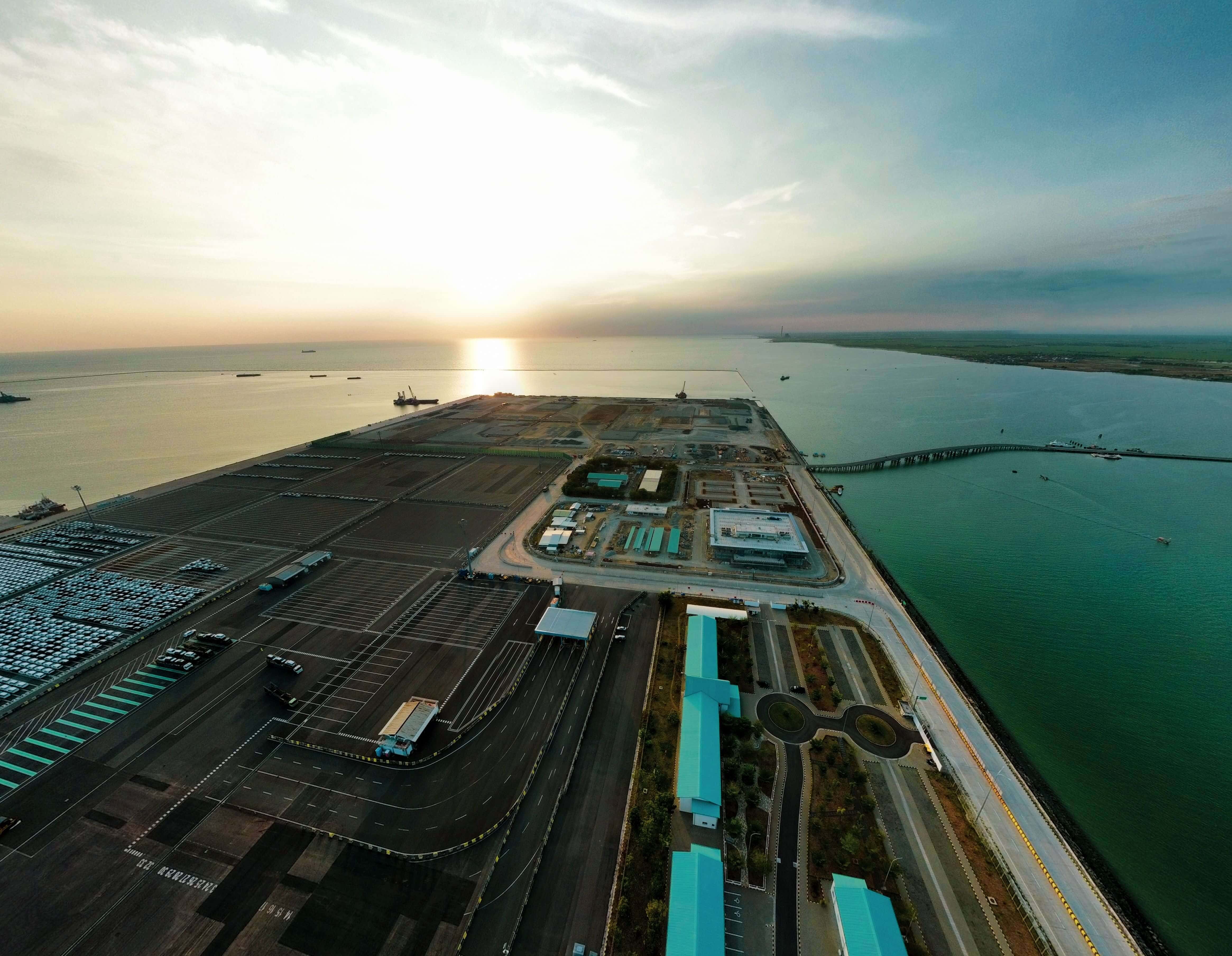 Aerial view of industrial port at sunrise